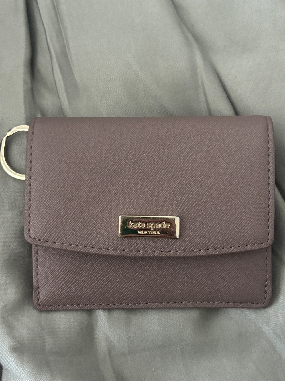 kate spade mauve leather cardholder with gold logo plaque